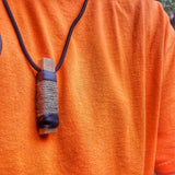 Survival Craft Collar: ParaCord Necklace, wire, fishline, tinder, firestarter, waxed wood.