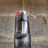 Survival Kit Lighter - Fire Starter outfitted with supplies.