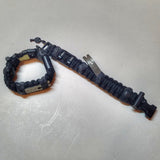 Urban Carry Strap - EDC Bracelet Titanium Pry Bar, Firestarter, Bottle Opener, Kevlar Saw, Cuff Key.