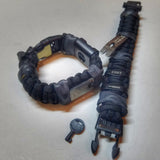 Urban Carry Strap - EDC Bracelet Titanium Pry Bar, Firestarter, Bottle Opener, Kevlar Saw, Cuff Key.