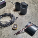 Survival Kit Lighter - Fire Starter outfitted with supplies.